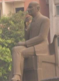 http://upload.wikimedia.org/wikipedia/commons/7/72/Mohammed_Abel_Wahab_statue-_Bab_El-Sheariyia0.JPG